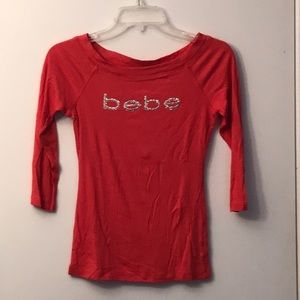 Bebe coral colored top
